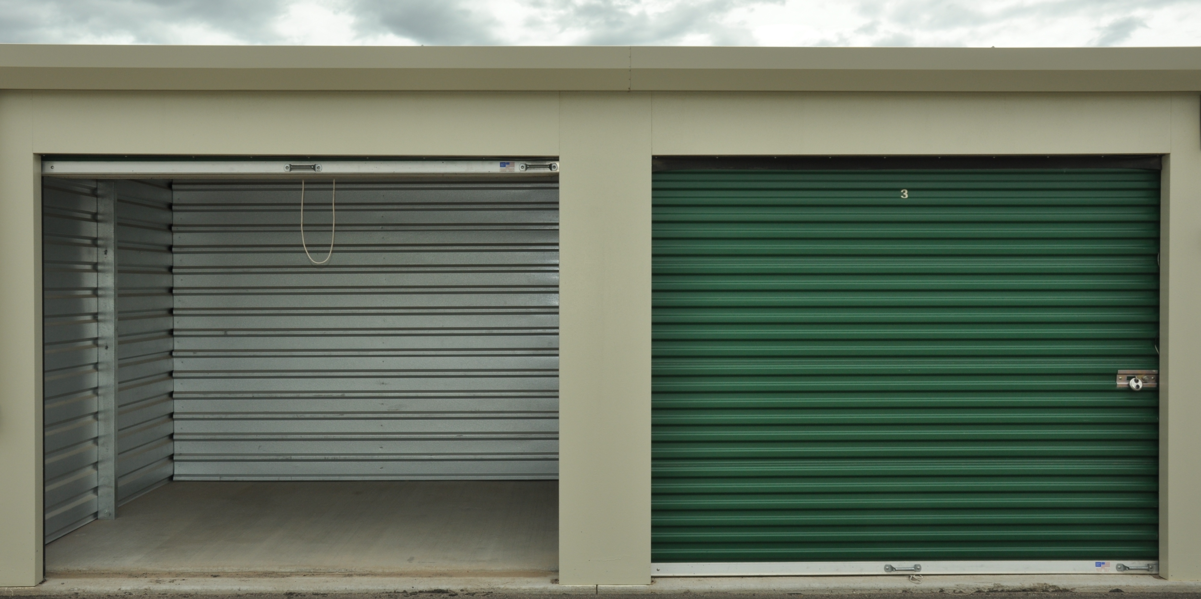 Drive-up storage units with roll-up doors at Demorest City Storage
